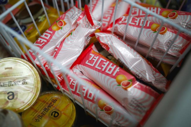 Ice cream bars named Gyeondyo-bar, which translates to "hang in there" are seen at a convenience store in Seoul